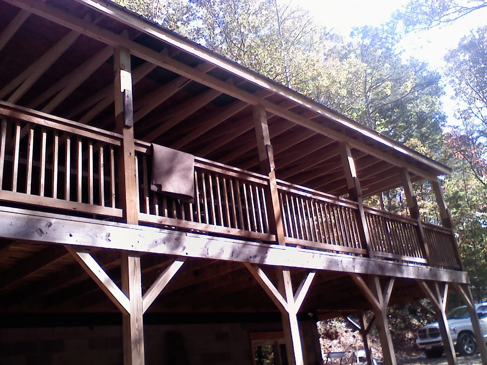 Timber framing under a new elevated porch and deck — Roof Leak Repair in Davison by Roofing Brothers
